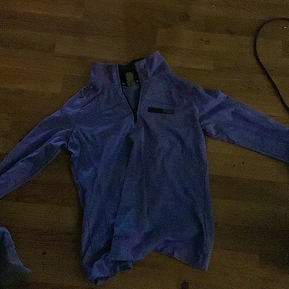 I am selling a pink pullover jacket